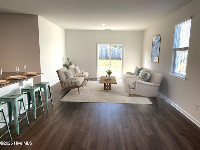 109 Mesa Ln, Holly Ridge, NC 28445 - living room featuring dark wood finished floors and healthy amount of natural light