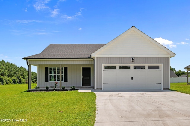 92 Hampton Way, Snow Hill, NC 28580 - view of front of home with an attached garage, covered porch, a front lawn, and concrete driveway