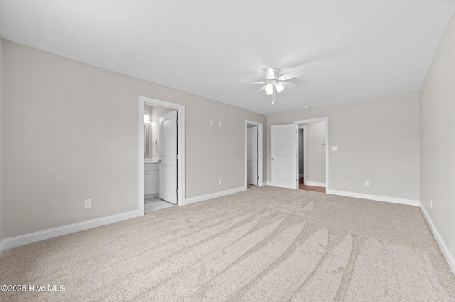 92 Hampton Way, Snow Hill, NC 28580 - unfurnished bedroom featuring carpet floors, ensuite bath, a walk in closet, and ceiling fan