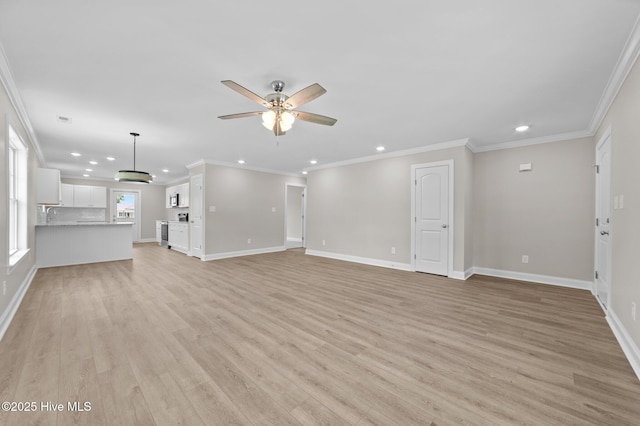 92 Hampton Way, Snow Hill, NC 28580 - unfurnished living room with recessed lighting, light wood-style floors, ceiling fan, and crown molding
