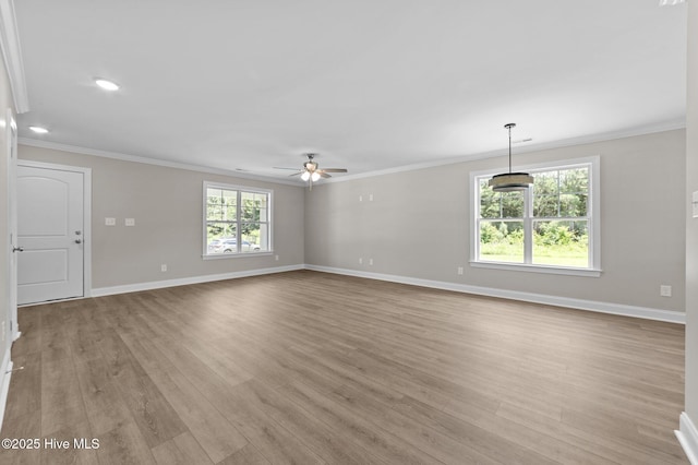 92 Hampton Way, Snow Hill, NC 28580 - unfurnished living room featuring crown molding, light wood-type flooring, a ceiling fan, and recessed lighting