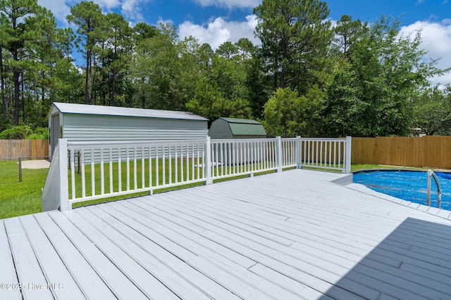 448 Edgewood & Rd, Southport, NC 28461 - wooden terrace featuring a shed, a fenced backyard, and view of scattered trees