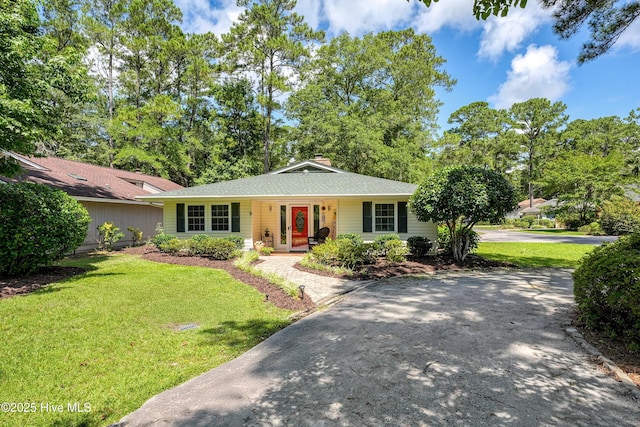 8 Gate 2, Carolina Shores, NC 28467 - ranch-style house featuring a front yard, driveway, a porch, and a chimney