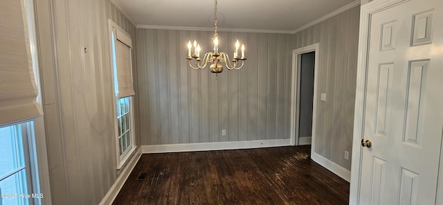 907 Raleigh Rd, Clinton, NC 28328 - unfurnished dining area with a chandelier, wood-type flooring, ornamental molding, and plenty of natural light