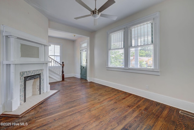 305 Mcrae St, Wilmington, NC 28401 - unfurnished living room with ceiling fan, wood finished floors, and a fireplace
