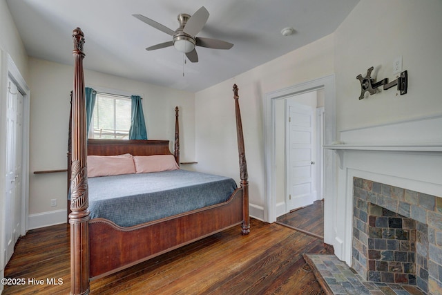 305 Mcrae St, Wilmington, NC 28401 - bedroom featuring wood finished floors, a fireplace, and a ceiling fan