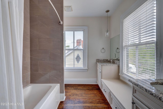 305 Mcrae St, Wilmington, NC 28401 - full bathroom with vanity, shower / tub combo with curtain, and wood finished floors
