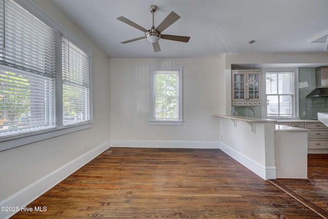 305 Mcrae St, Wilmington, NC 28401 - unfurnished dining area featuring dark wood finished floors and ceiling fan