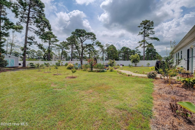 881 Golf View Rd, Southport, NC 28461 - fenced backyard featuring a shed