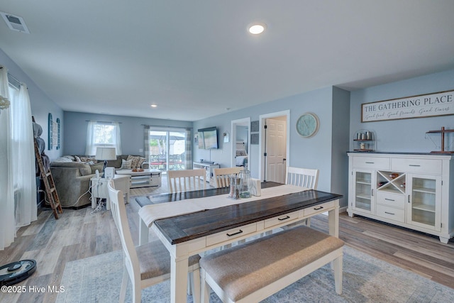 870 Westway Rd, Southport, NC 28461 - dining room with light wood finished floors and recessed lighting