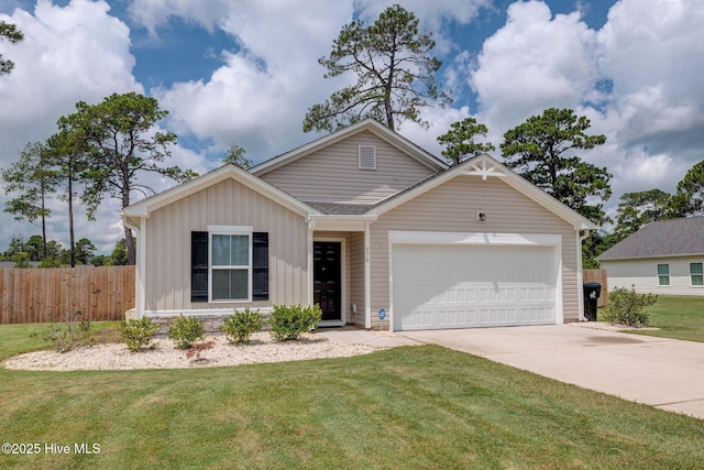 870 Westway Rd, Southport, NC 28461 - view of front of property with driveway, an attached garage, and board and batten siding