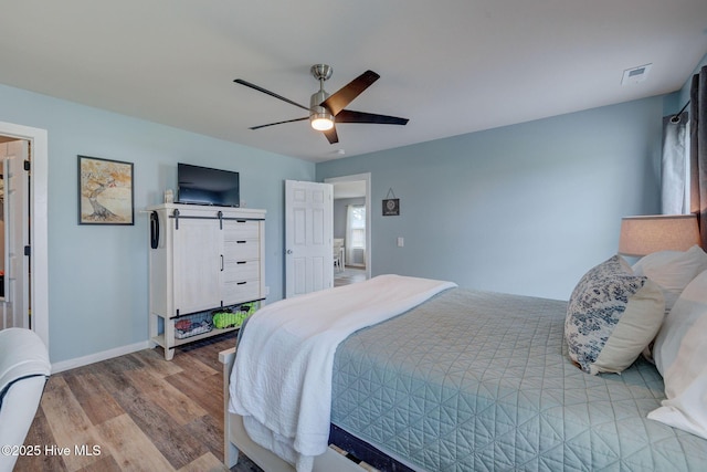 870 Westway Rd, Southport, NC 28461 - bedroom featuring wood finished floors and a ceiling fan