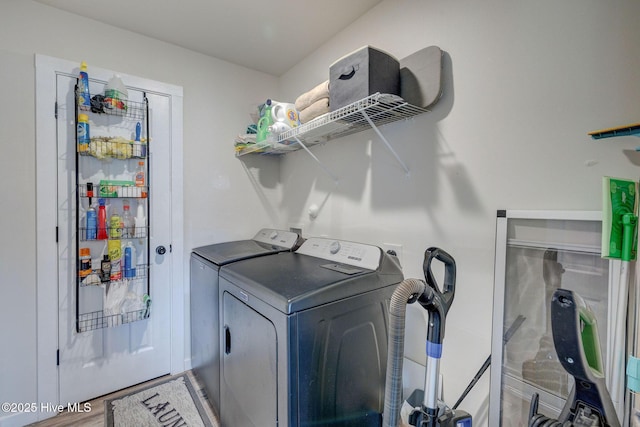 870 Westway Rd, Southport, NC 28461 - washroom featuring separate washer and dryer and wood finished floors