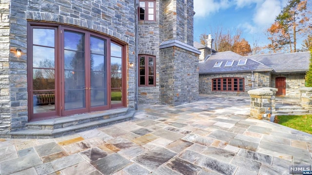 exterior space with french doors and a patio