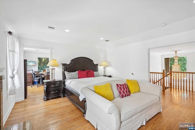 bedroom with light wood-type flooring