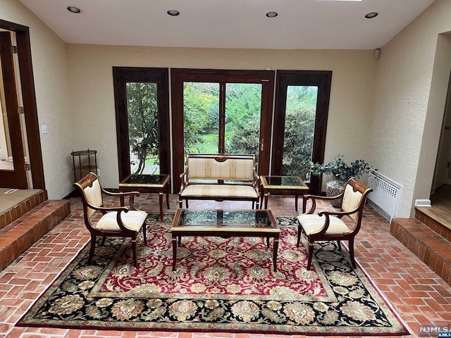 living area featuring radiator heating unit