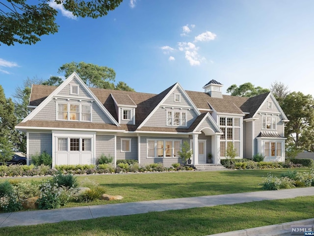 view of front of home featuring a front yard