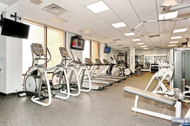 gym with a drop ceiling