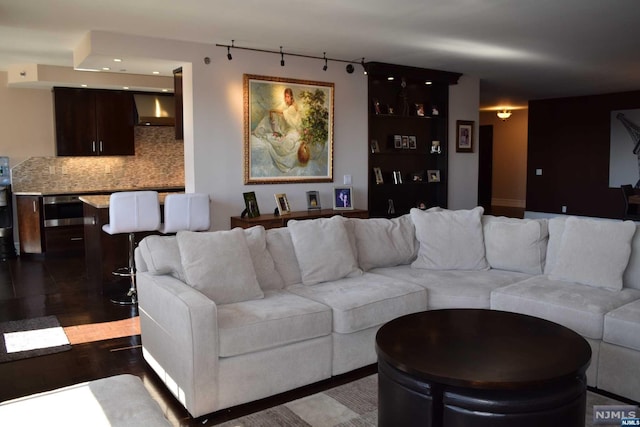 living room with dark hardwood / wood-style floors