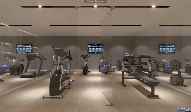 workout area featuring light hardwood / wood-style flooring