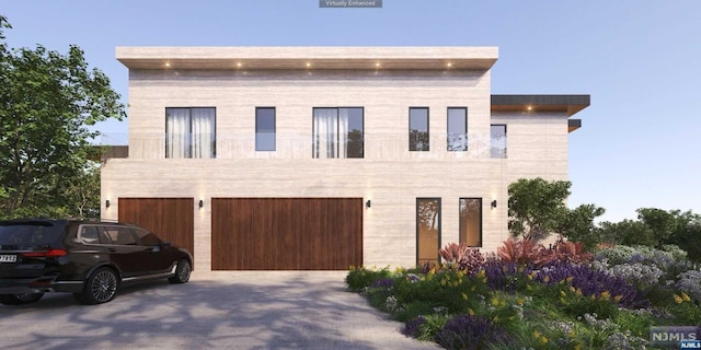 view of front of home with a garage