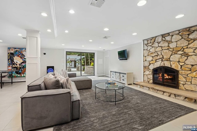 tiled living room with a fireplace and a baseboard radiator