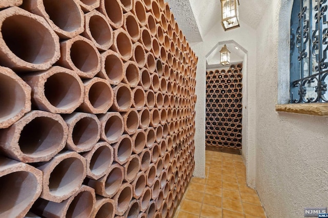 wine cellar featuring light tile patterned floors