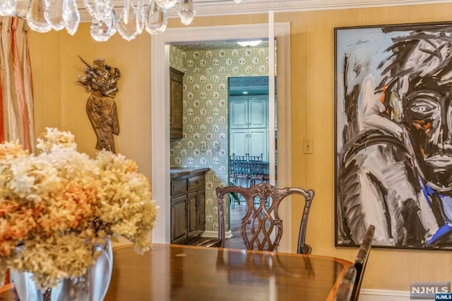 dining space with hardwood / wood-style flooring