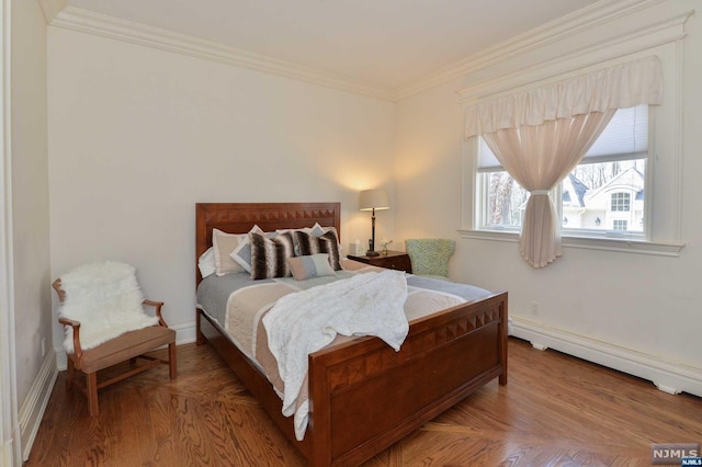 bedroom with ornamental molding