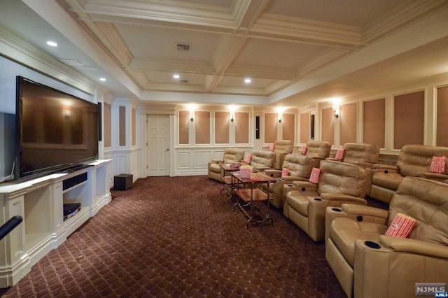 cinema room featuring dark colored carpet, ornamental molding, beamed ceiling, and coffered ceiling