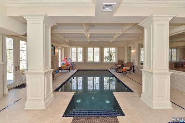 view of swimming pool featuring french doors