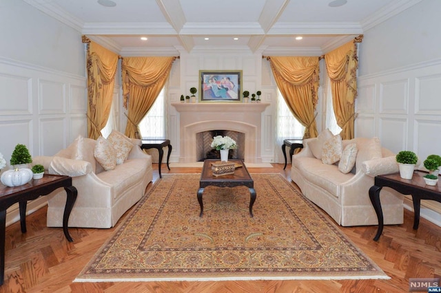 living room featuring beamed ceiling, ornamental molding, and light parquet flooring