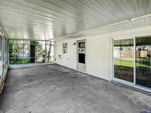 view of unfurnished sunroom