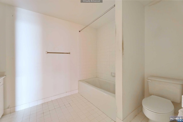 bathroom featuring tile patterned floors, shower / washtub combination, and toilet