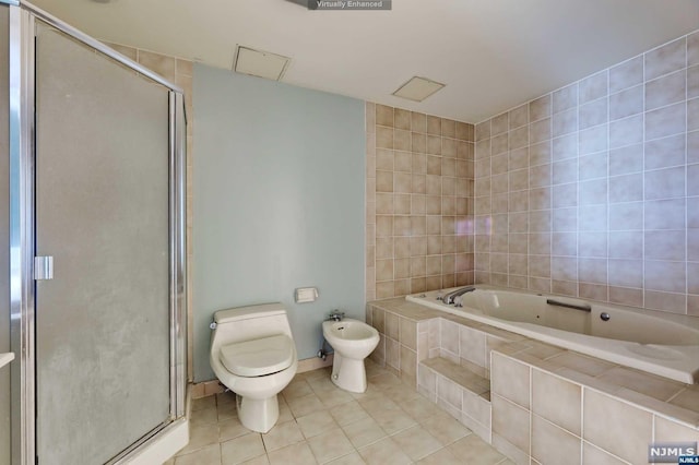 bathroom with tile patterned flooring, separate shower and tub, toilet, and a bidet