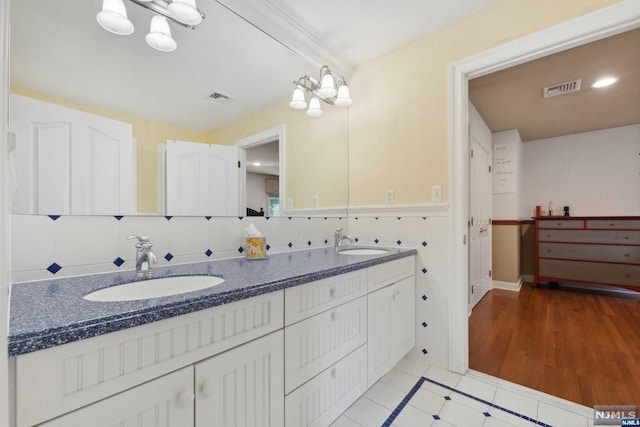 bathroom featuring hardwood / wood-style floors and vanity