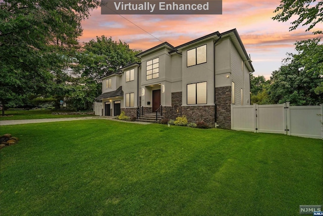 view of front of house with a lawn