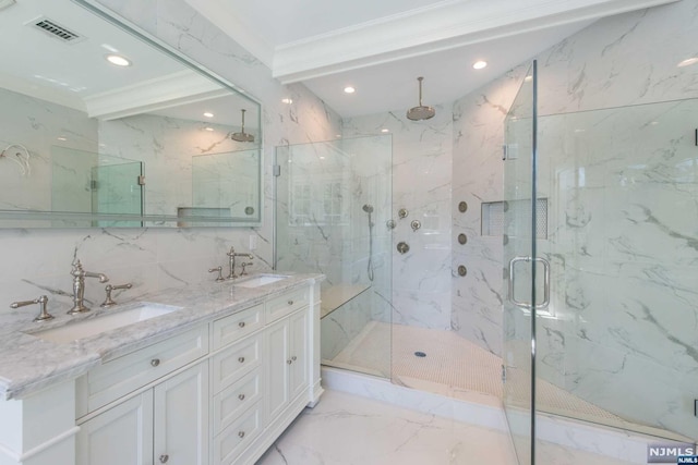 bathroom featuring walk in shower, vanity, tile walls, and crown molding