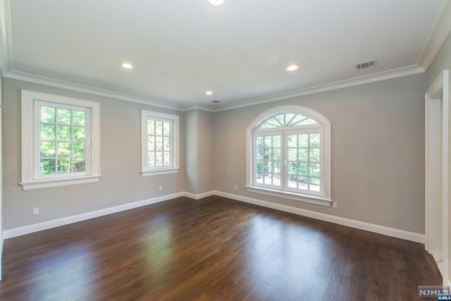 unfurnished room featuring dark hardwood / wood-style flooring and crown molding