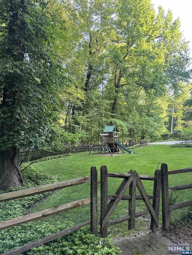 view of yard featuring a playground