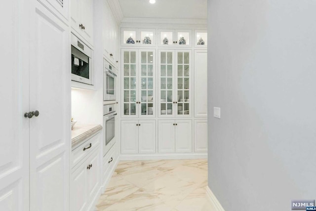 interior space with crown molding