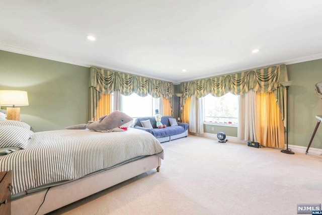 bedroom with carpet floors and ornamental molding