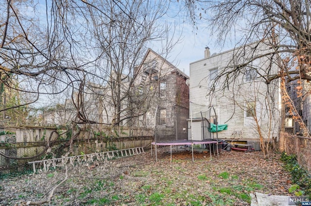 view of yard featuring a trampoline