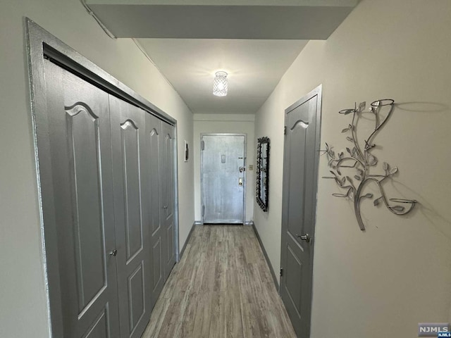 entryway with light hardwood / wood-style floors