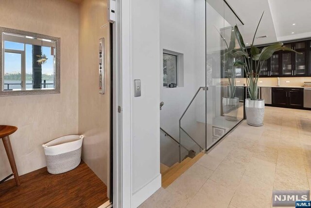 bathroom with tile patterned floors