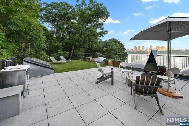 view of patio / terrace featuring a balcony