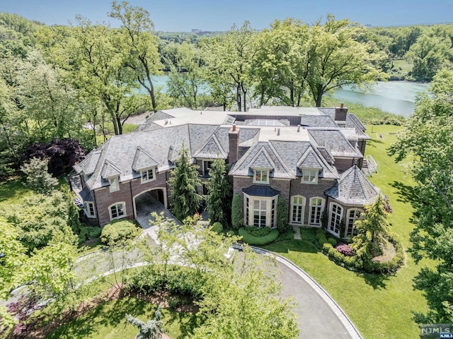 bird's eye view with a water view