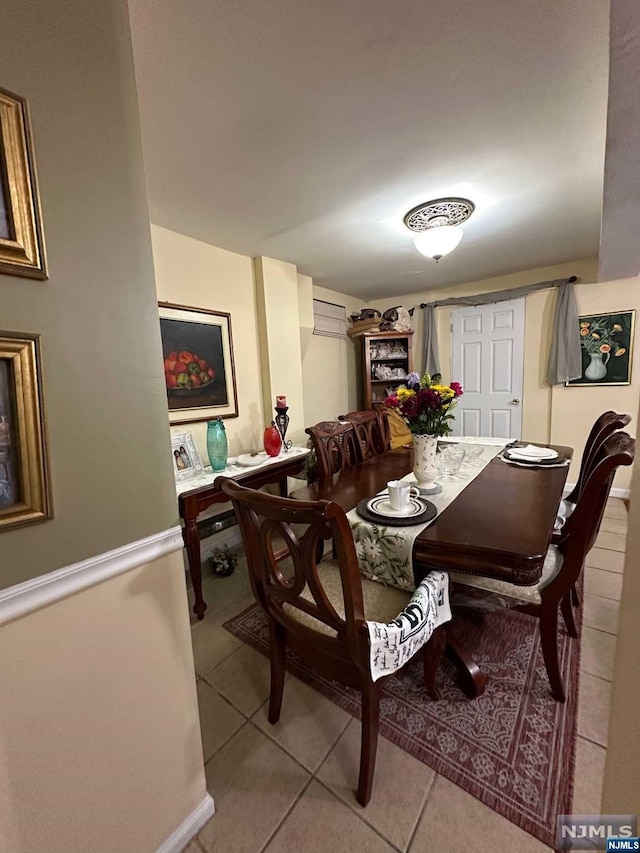 view of tiled dining space