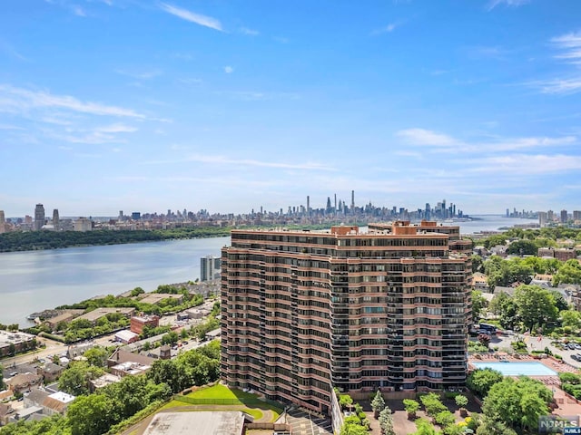 birds eye view of property featuring a water view