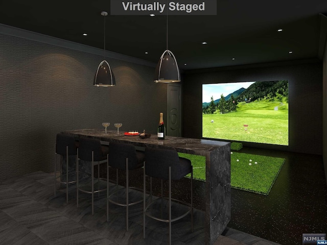 bar featuring golf simulator and ornamental molding